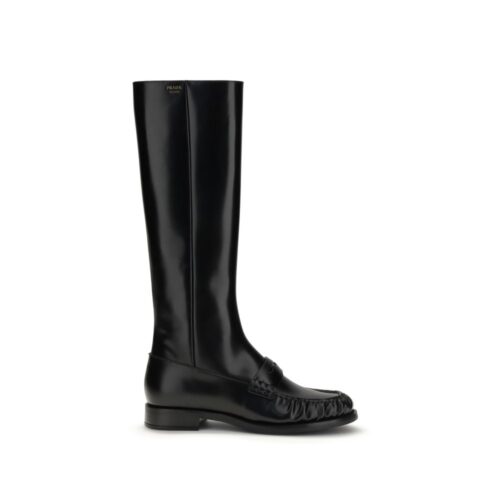 10099932.jpeg Prada Black Calf Leather Bos Taurus Flat Boots