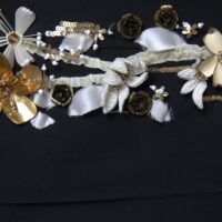 Dolce & Gabbana Mustad lilleaplikatsioonidega kõrge vöökohaga kitsenevad püksid