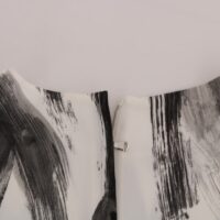 Dolce & Gabbana must-valge triibuline pluus