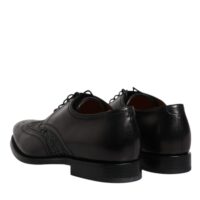 Dolce & Gabbana Mustad derbi kingad tiivakujulise mustriga