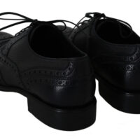 811131.jpg Dolce & Gabbana tumesinised brogue-oxford pidulikud kingad Derby Taormina