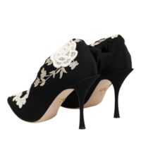 Dolce & Gabbana must-valged tikandiga jersey-stiilis stilettosaapad