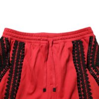 Dolce & Gabbana punased tikanditega vabaaja lühendatud püksid
