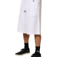 Dolce & Gabbana valged puuvillased rebitud Bermuda dressipüksid